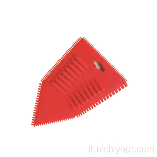 Raschietto trapeziforme in plastica artistica con denti